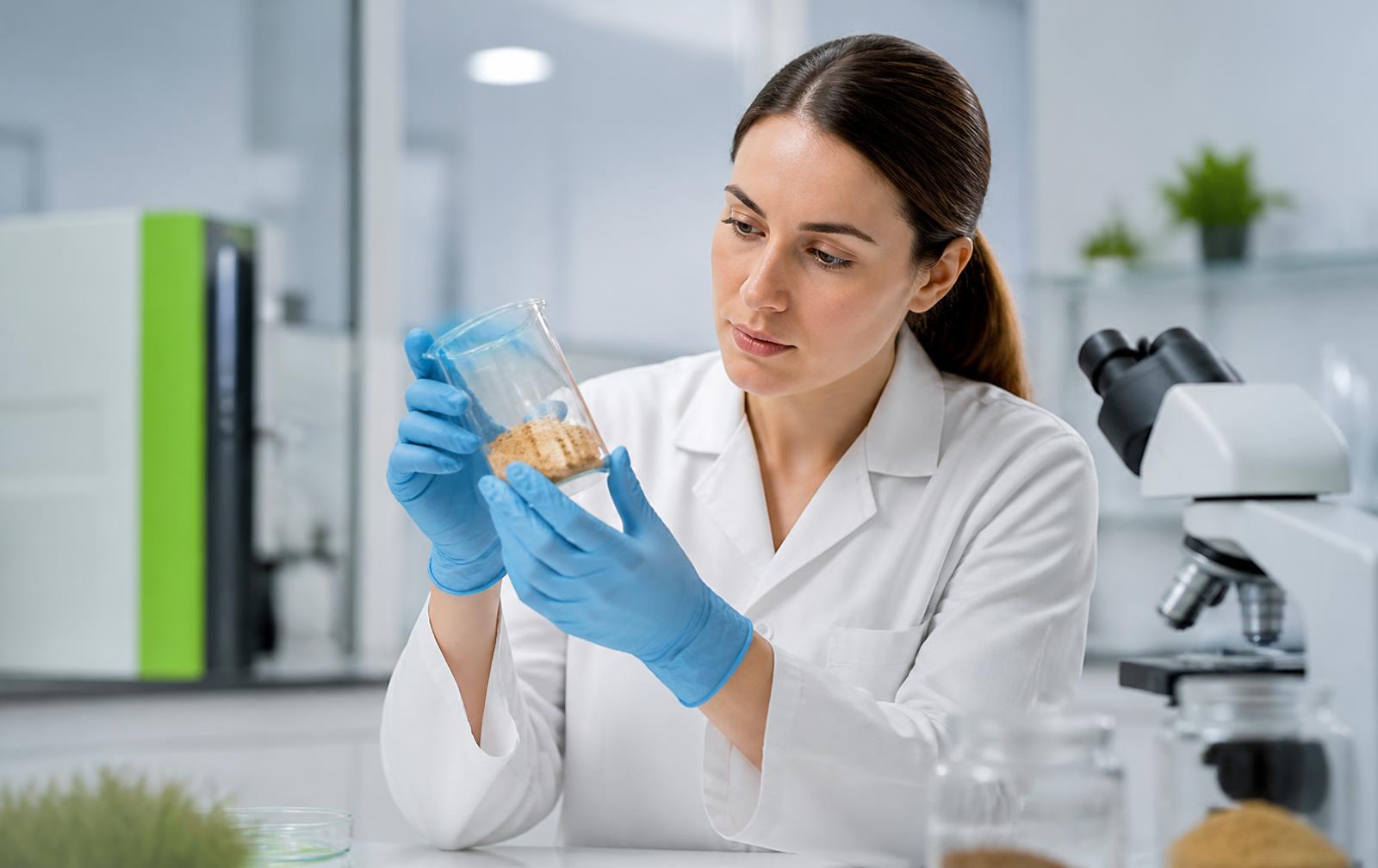 Laboratory technician evaluating a gum arabic sample